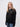 Murray Edwards student wearing a black 1/4 zip sweatshirt