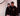 Two people wearing black sweatshirts with visible logos against a white background