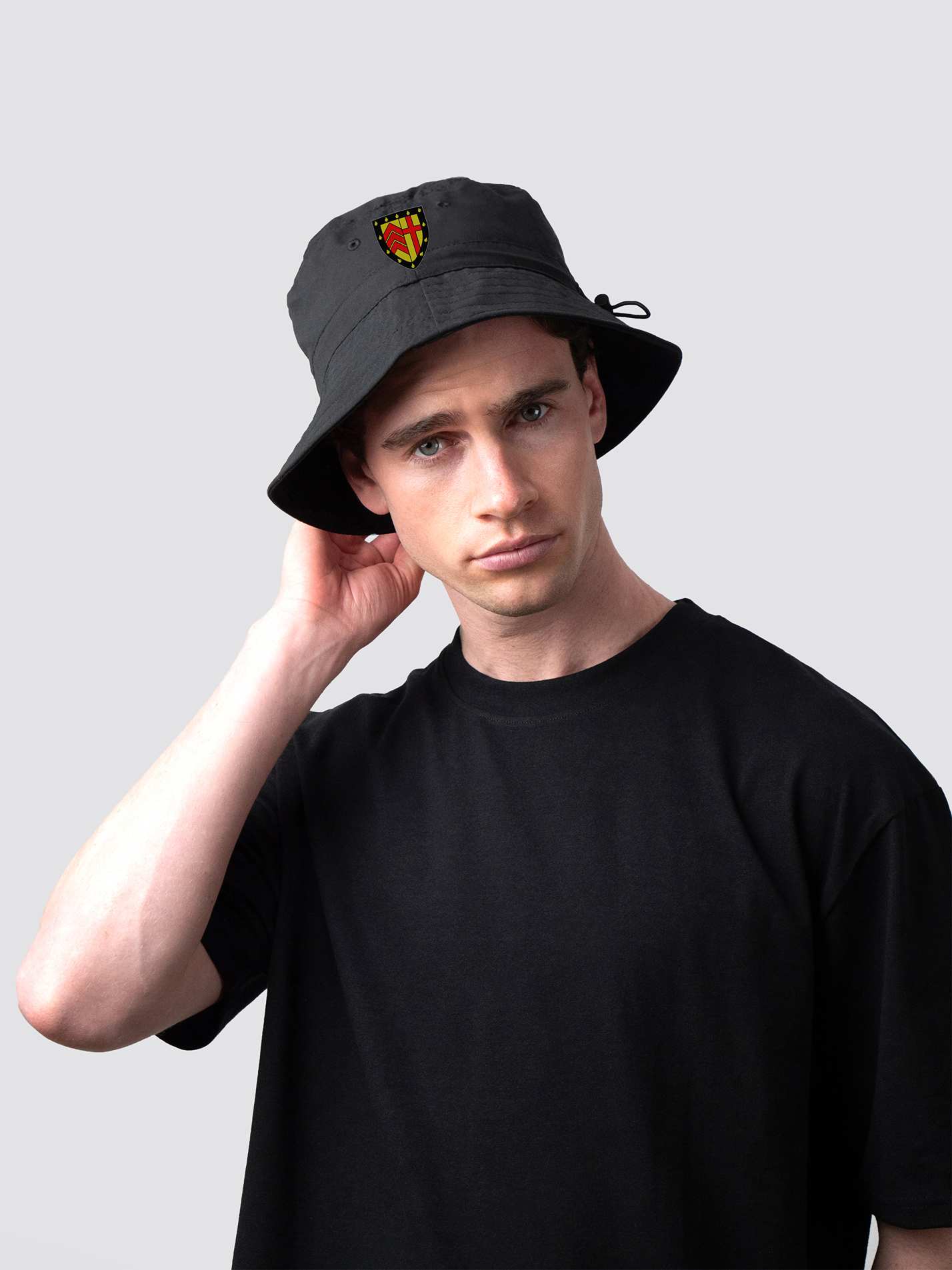 Black bucket hat, with embroidered Clare College crest