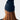 A female student wearing a navy beanie for the winter weather