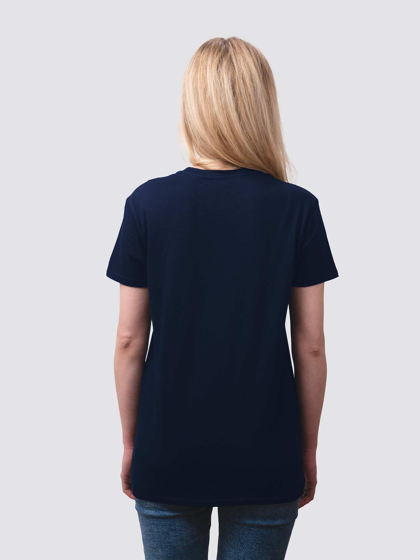 The back of a navy short-sleeve shirt, worn by a female studen