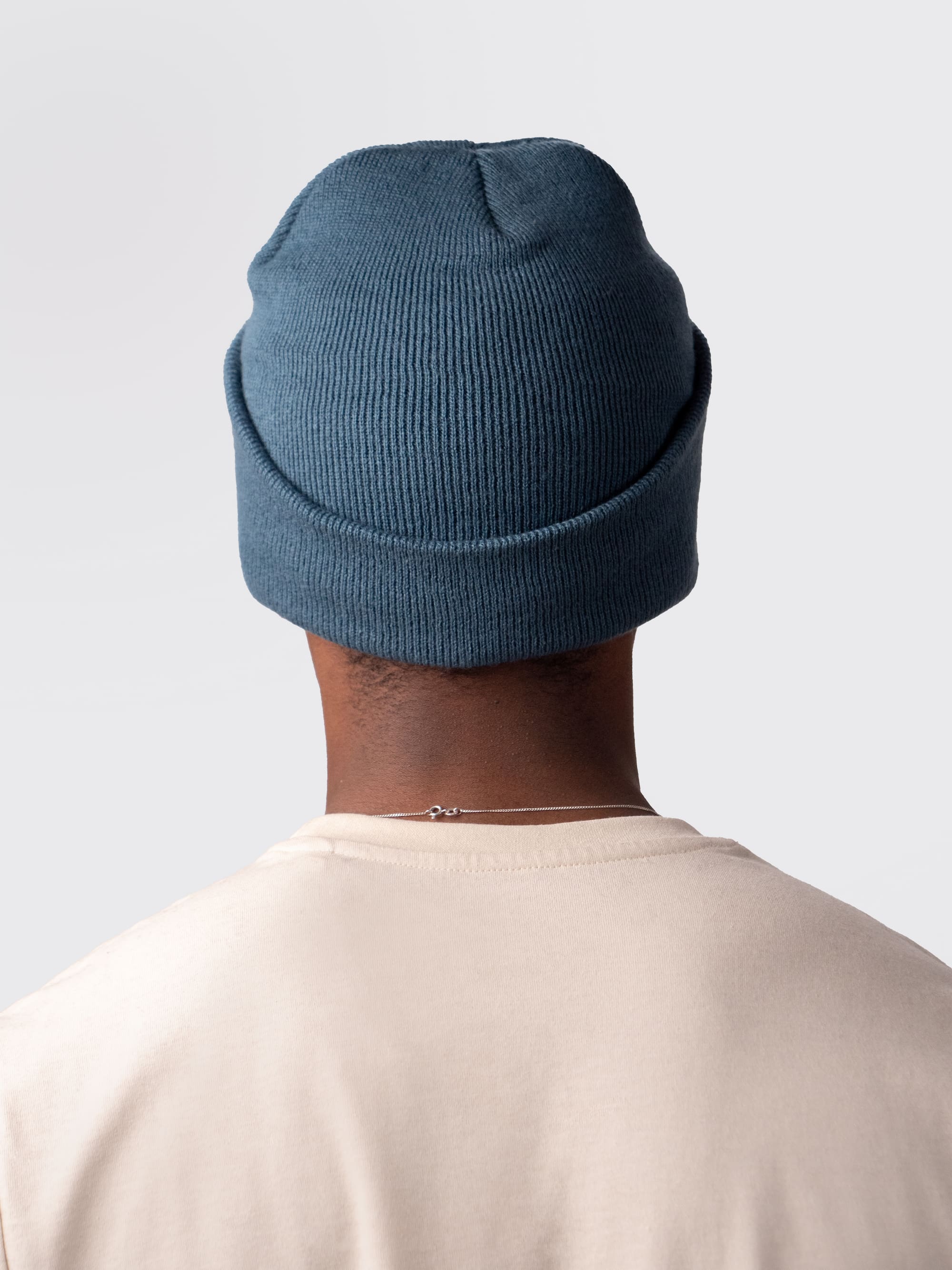 The back of an extra warm, Cambridge University knitted beanie