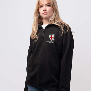 Durham Law Society student wearing a black 1/4 zip sweatshirt 