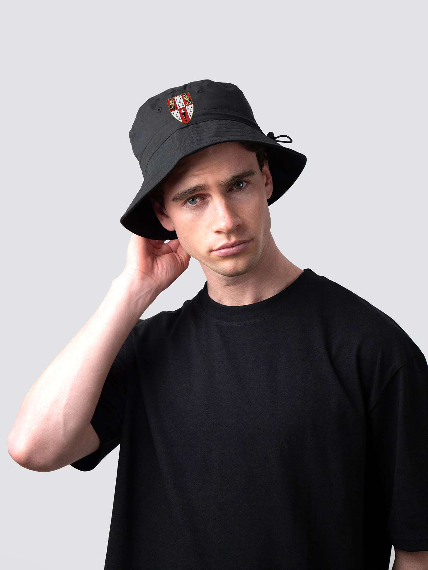 Black bucket hat, with embroidered Hughes Hall College crest