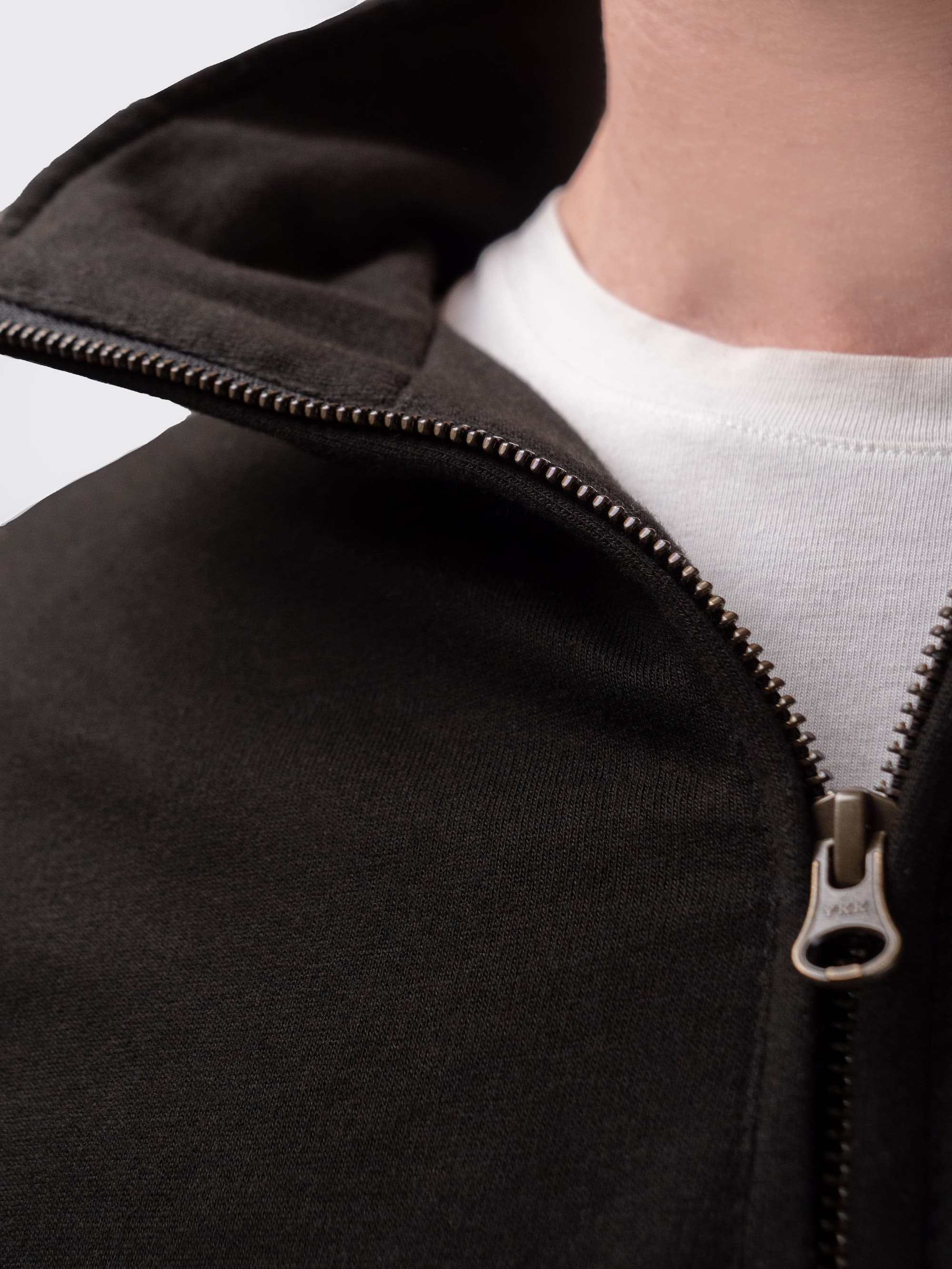 Black, unisex sweater with premium YKK zip