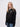King's student wearing a black 1/4 zip sweatshirt