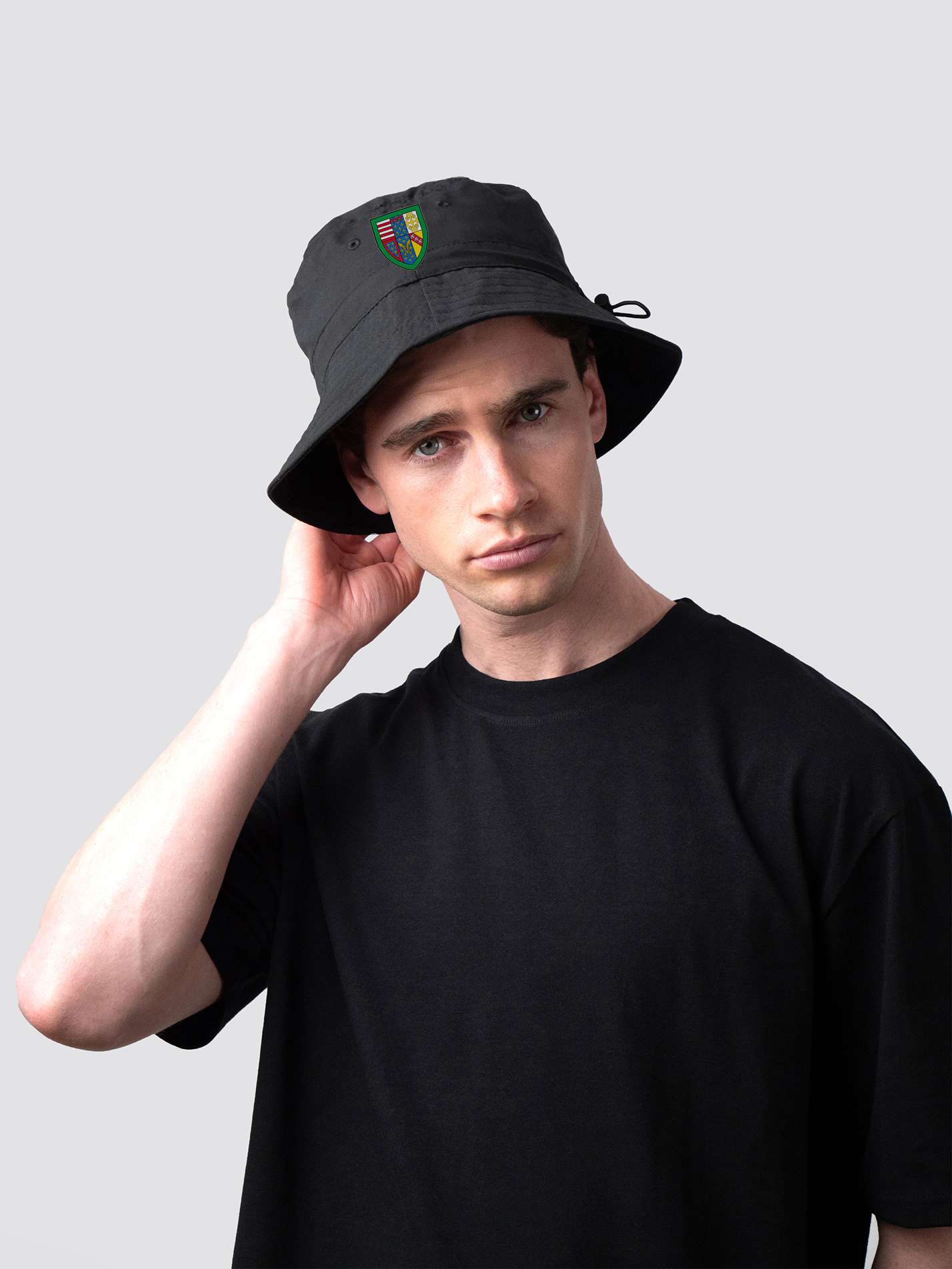 Black bucket hat, with embroidered Queens' College crest