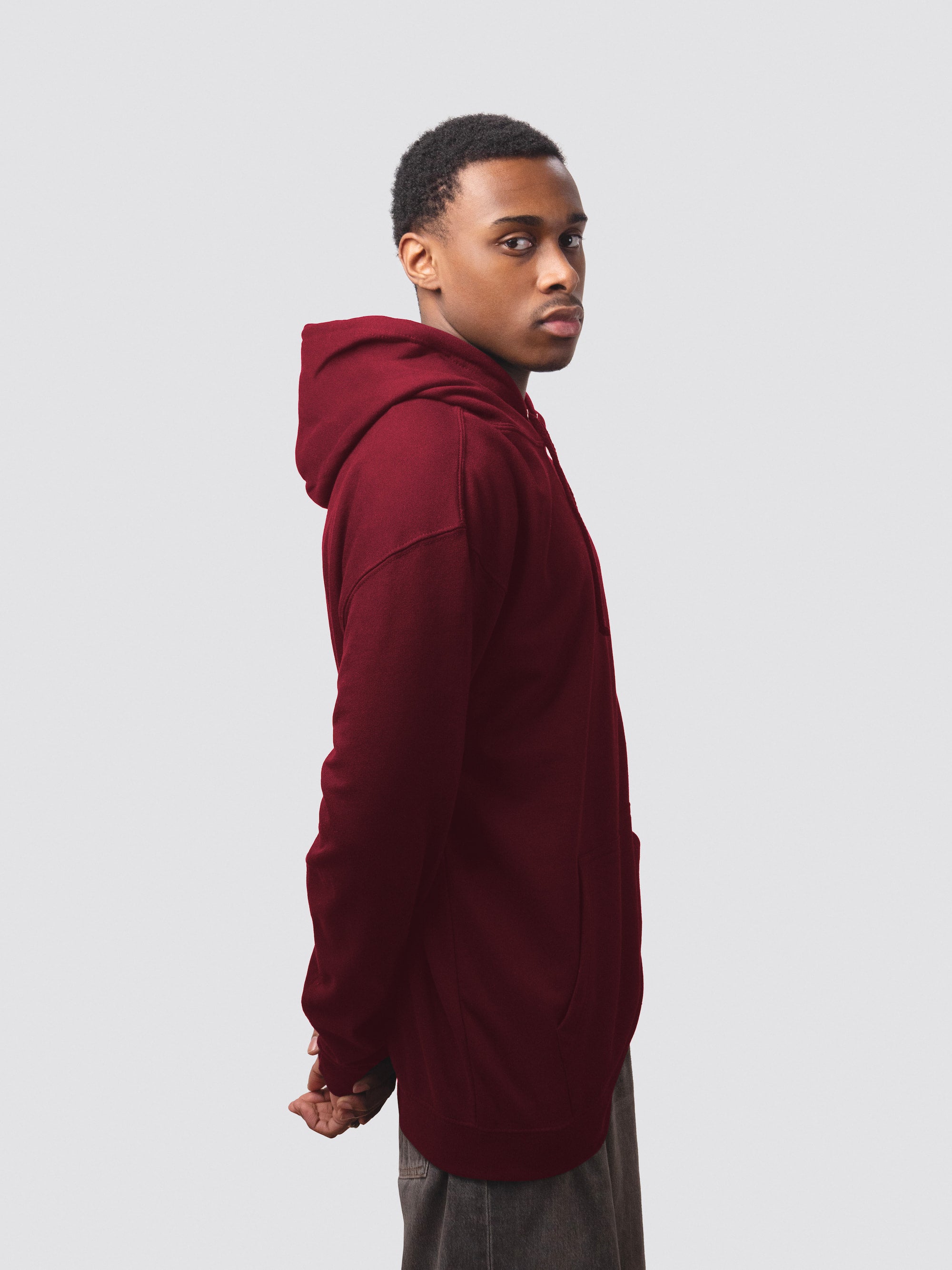 Queens' College hoodie, made from burgundy cotton-faced fabric