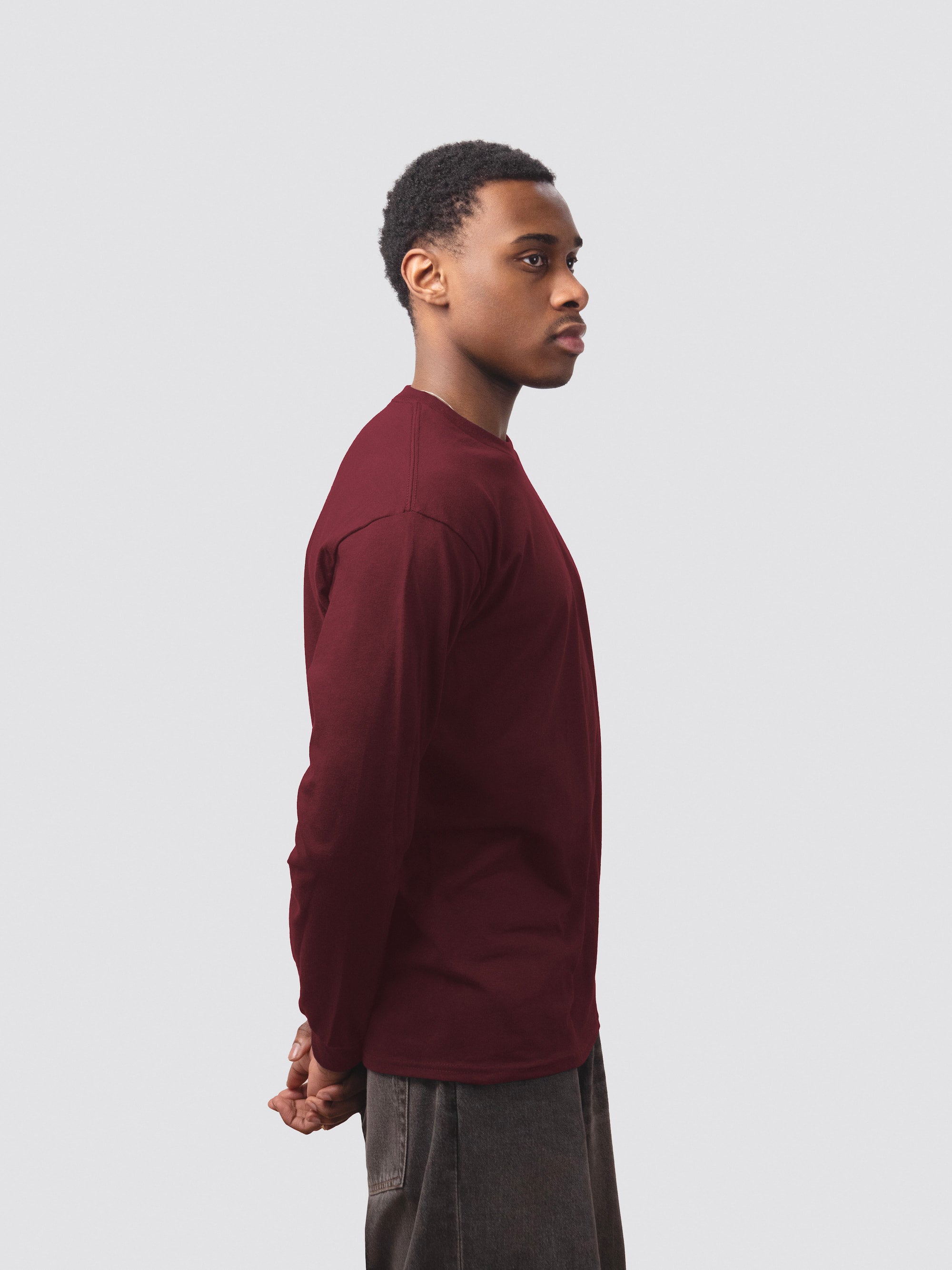 Burgundy long sleeve from Redbird, worn by male student model