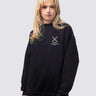 St Catherine's College crest on the front of a black, crew-neck sweatshirt