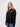 St Chad's student wearing a black 1/4 zip sweatshirt