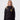 A student wearing a sustainable, St Edmund Hall College embroidered jacket