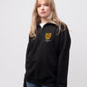 St Edmund Hall student wearing a black 1/4 zip sweatshirt