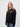 St Edmund Hall student wearing a black 1/4 zip sweatshirt