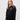 St Hilda's College student wearing a black 1/4 zip sweatshirt 