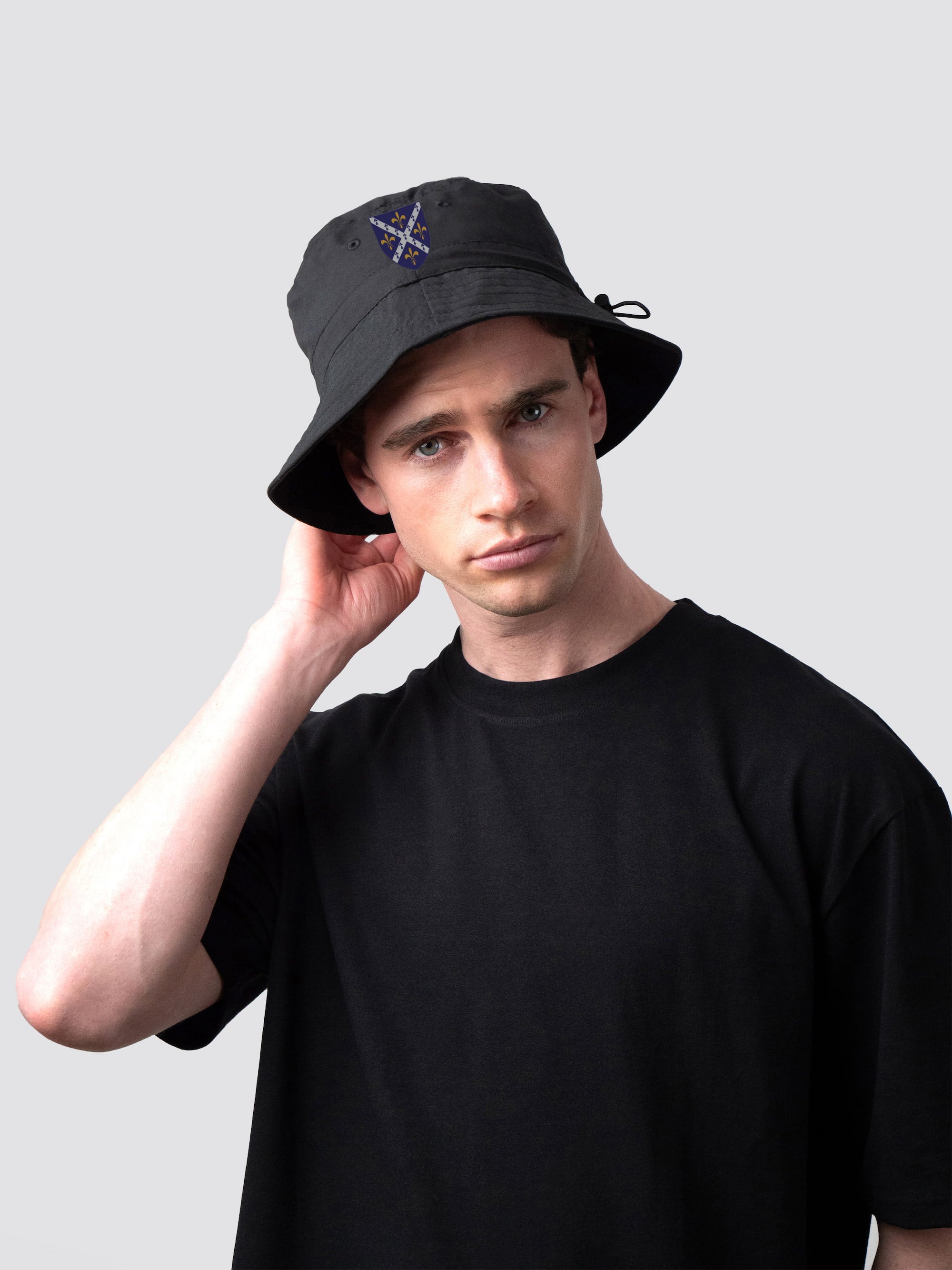 Black bucket hat, with embroidered St Hugh's College crest