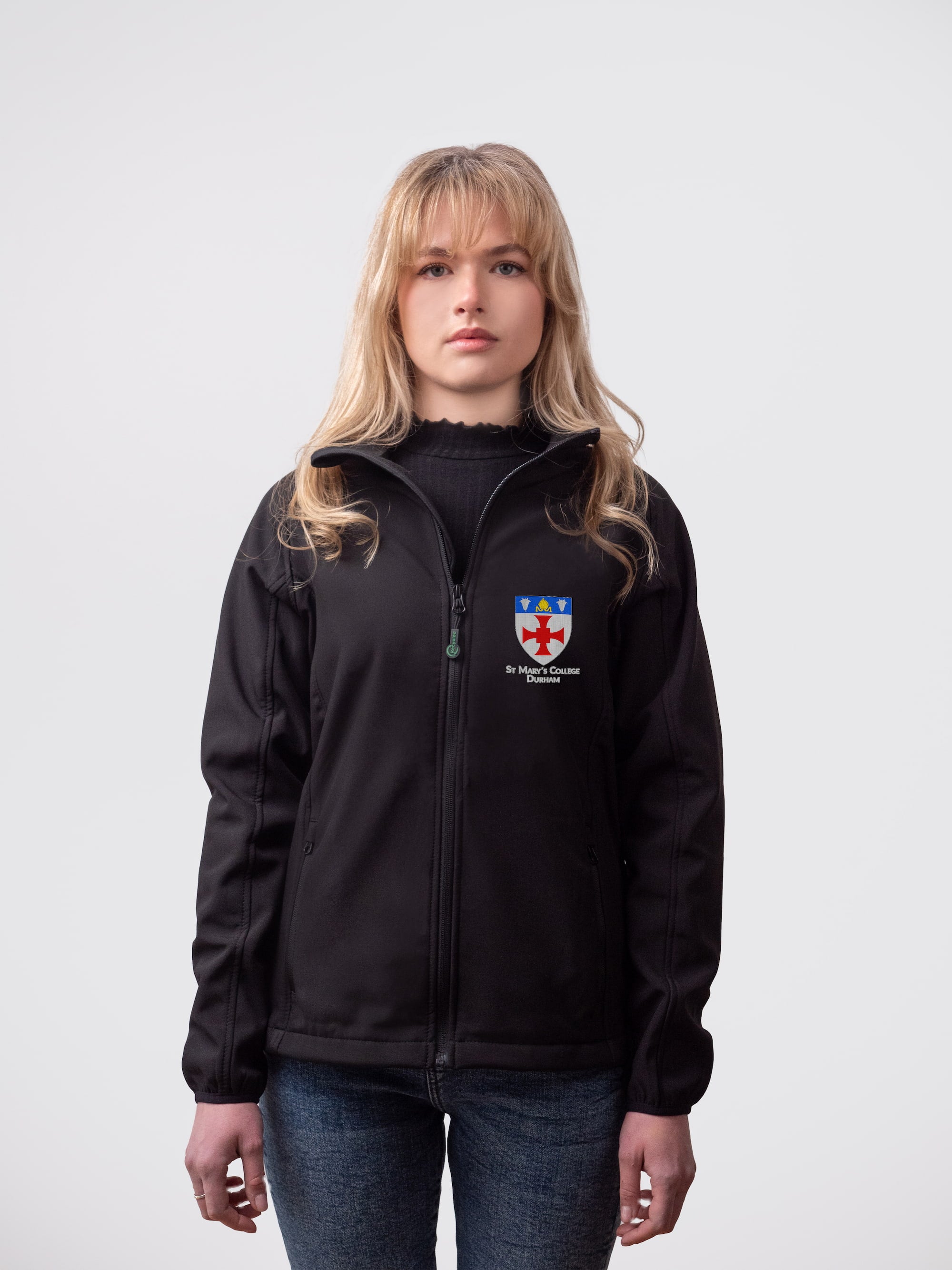 A student wearing a sustainable, St Mary's College embroidered jacket