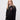 The Queen's student wearing a black 1/4 zip sweatshirt 