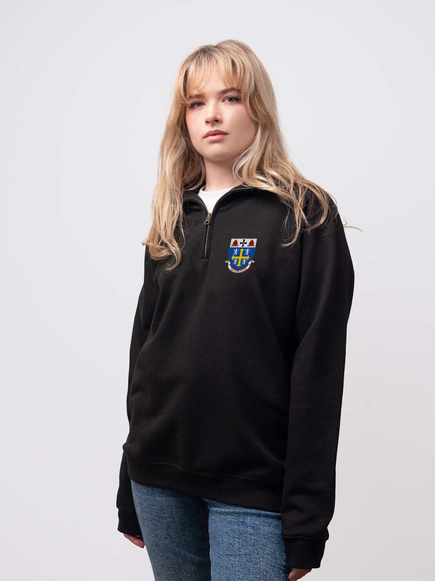 University College student wearing a black 1/4 zip sweatshirt 